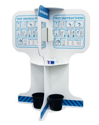 white boarded test instructions stand